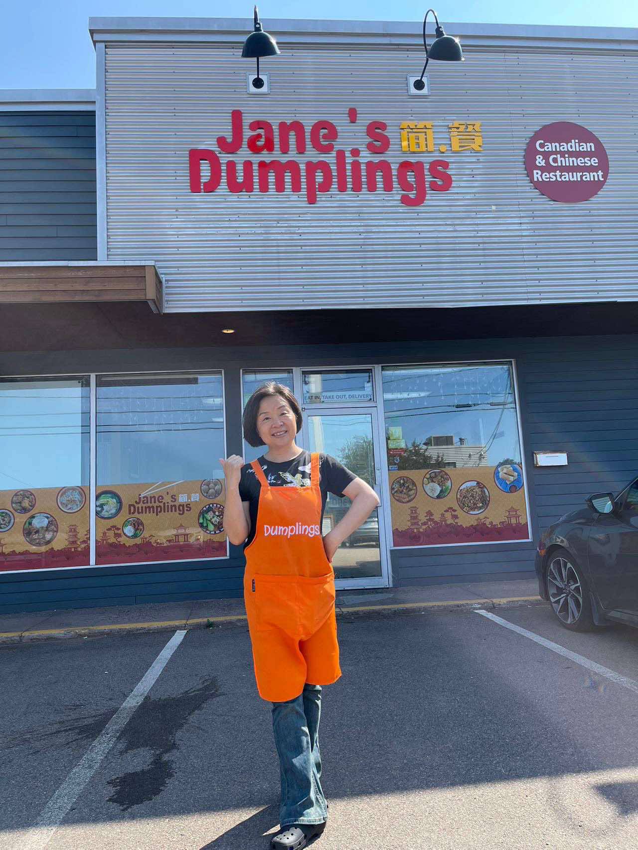Jin Jia in front of Jane's Dumplings